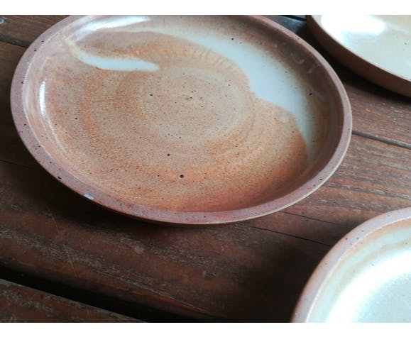 Lot of 4 deep plates made of vintage sandstone