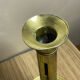 Duo of brass push candle holders