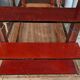 Gold metal wall shelf