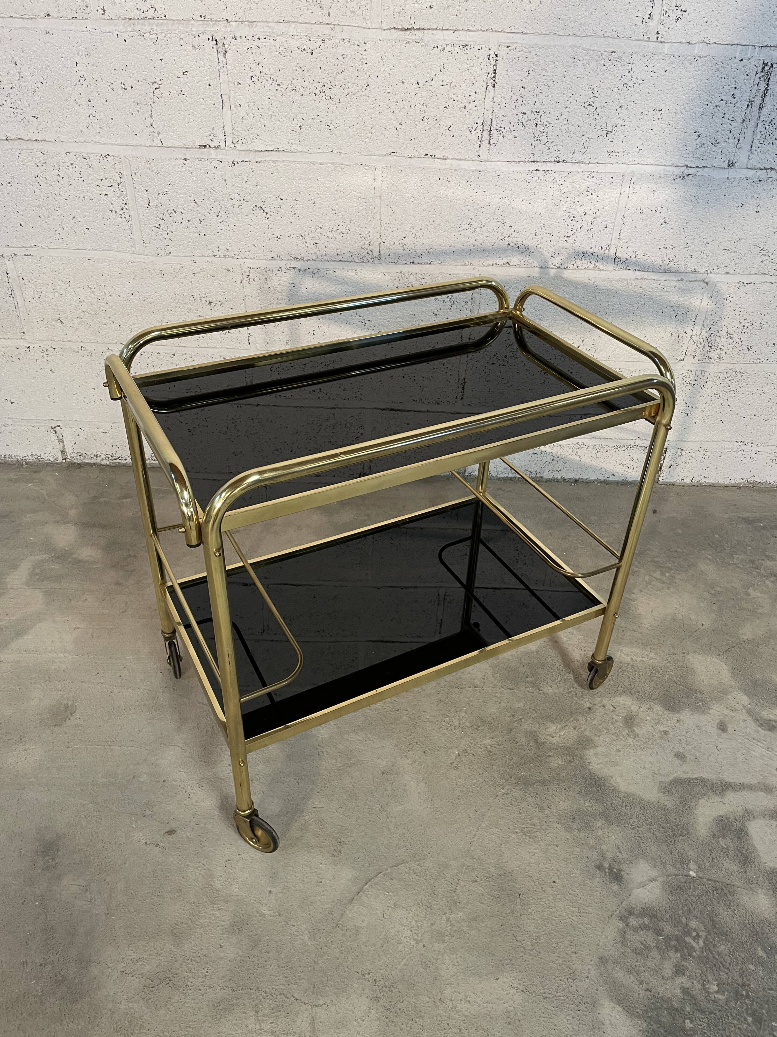 Vintage golden and black rolling service 1970s