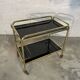 Vintage golden and black rolling service 1970s