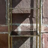 Shelf with gold metal structure