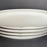 4 small oval porcelain dishes