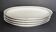 4 petits plats ovales en porcelaine