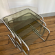 Vintage chrome trundle tables and smoked glasses 1970