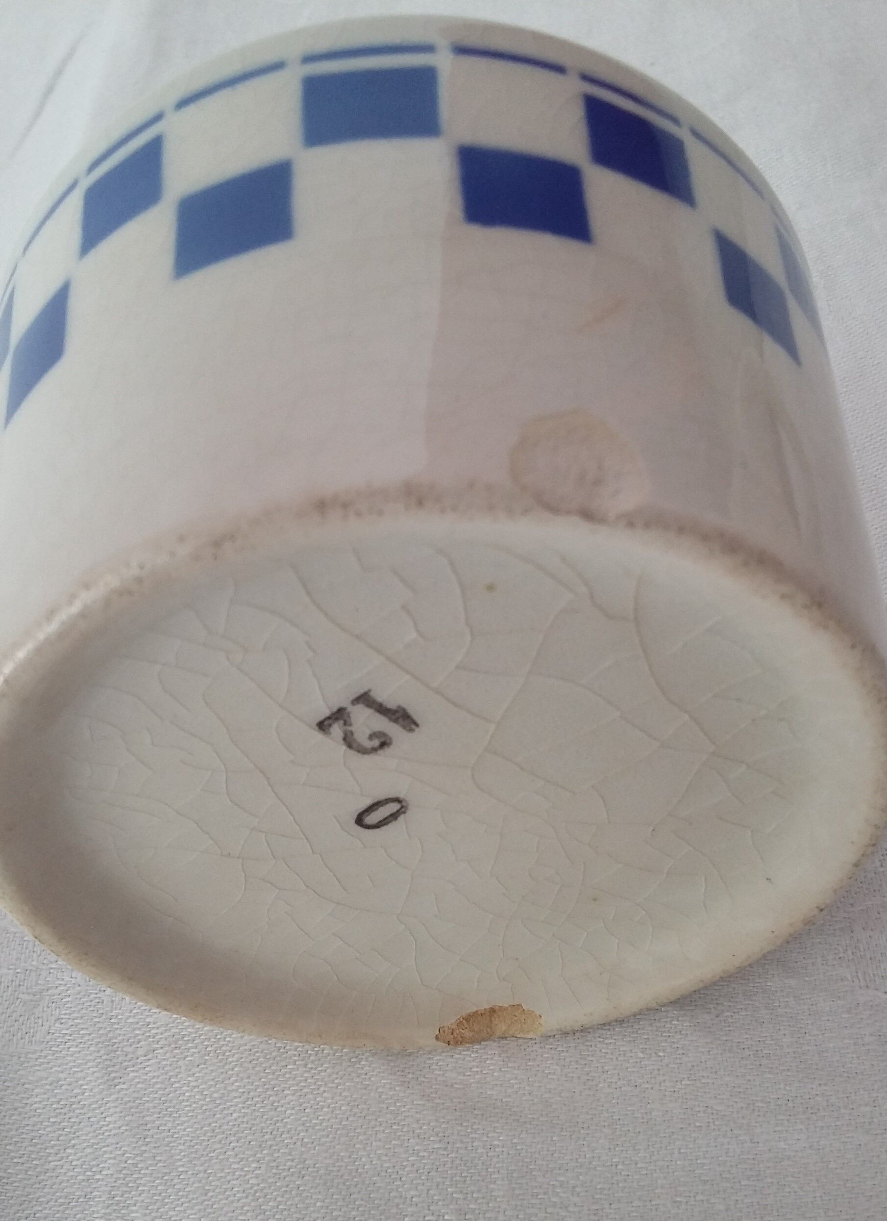 Blue checkerboard cup