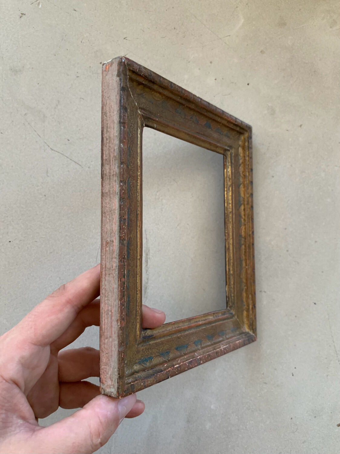 Small old oriental golden frame
