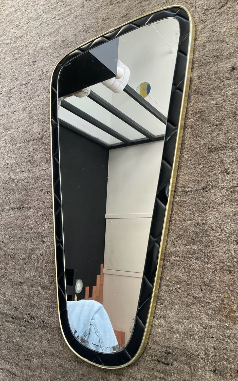 Asymmetrical mirror from the 1960s.