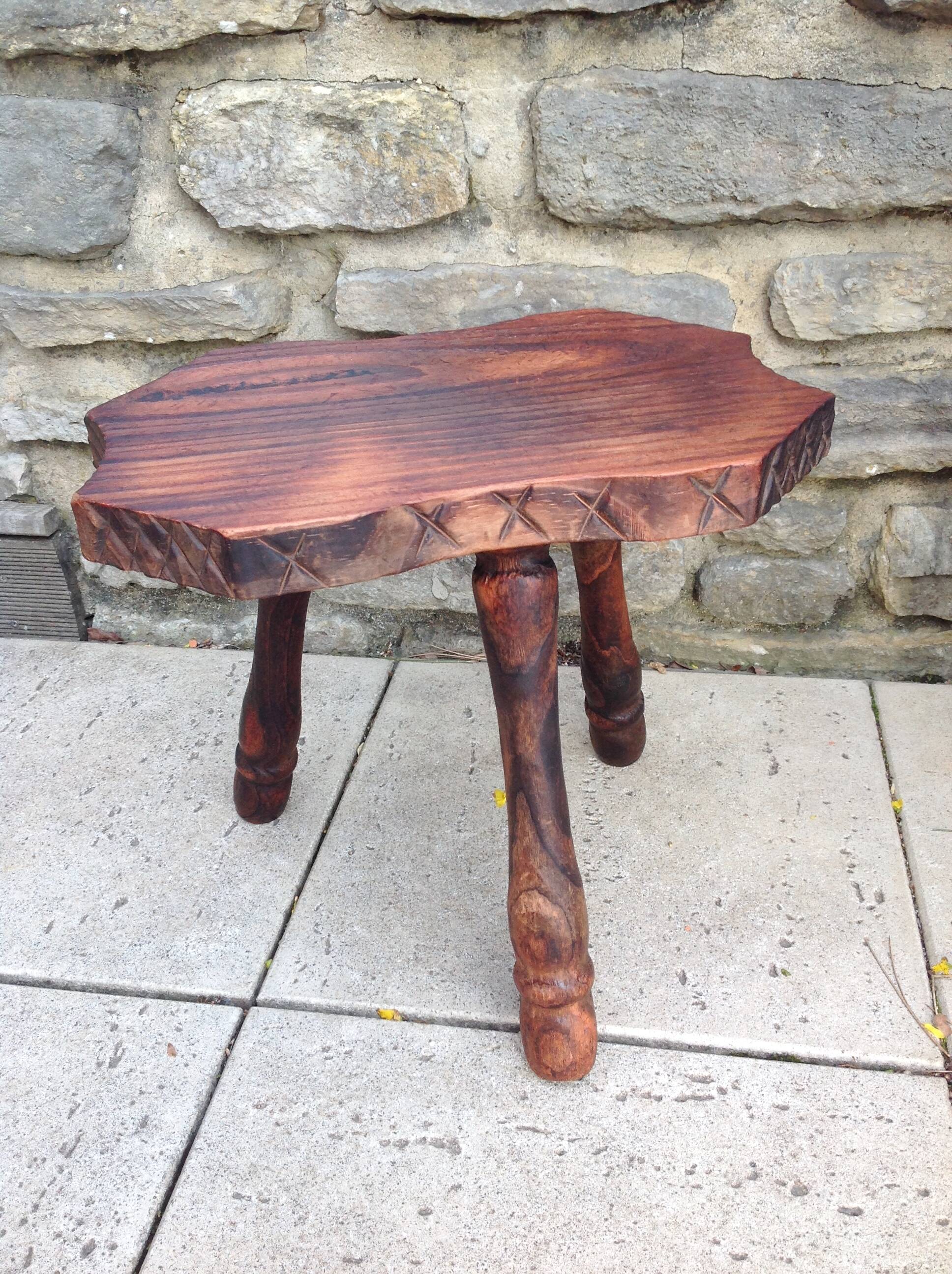 Vintage brutalist wooden tripod stool from the 60s and 70s