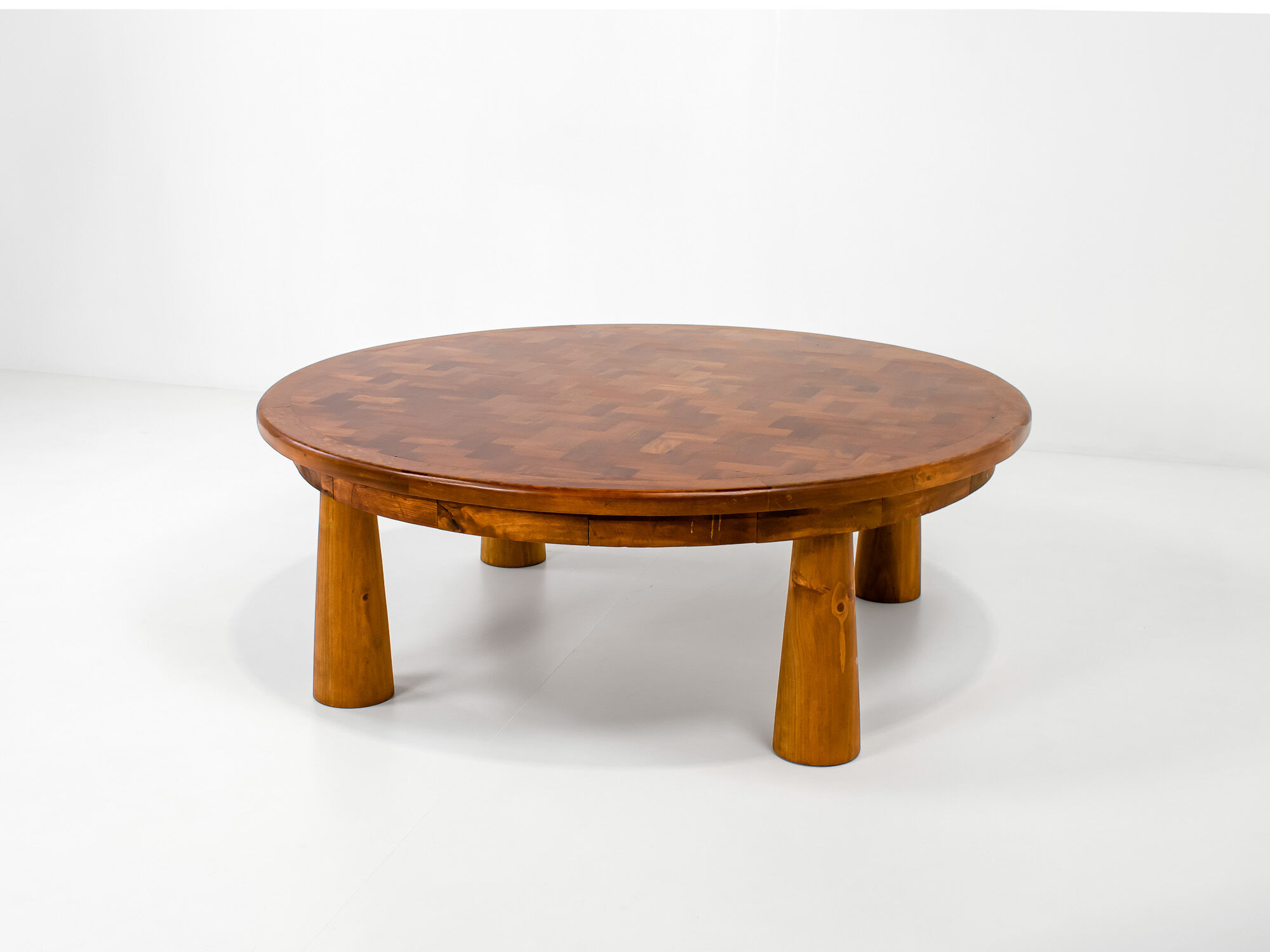 Round parquet coffee table with conical legs, spain