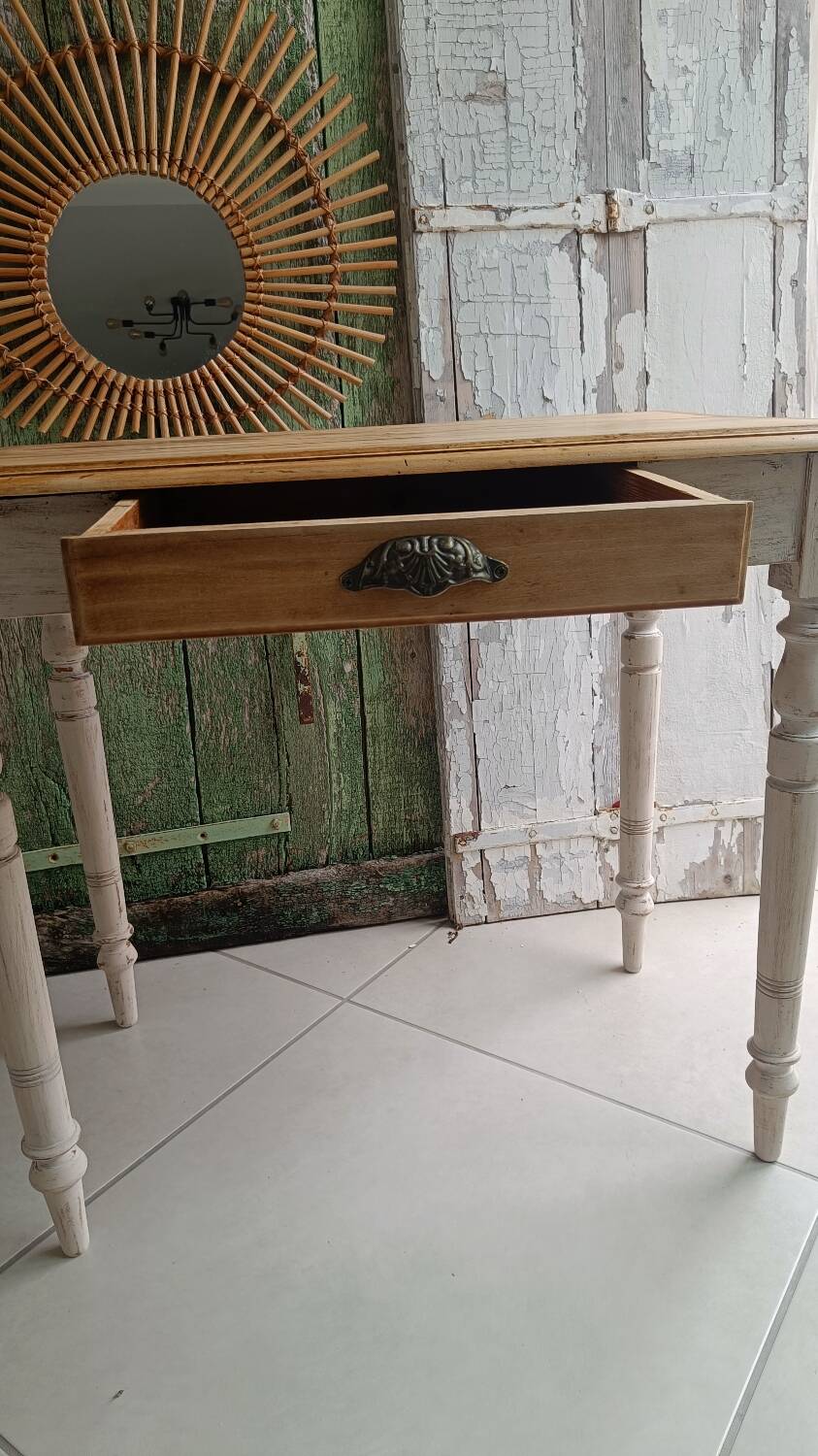 Antique wooden desk with a patinated base