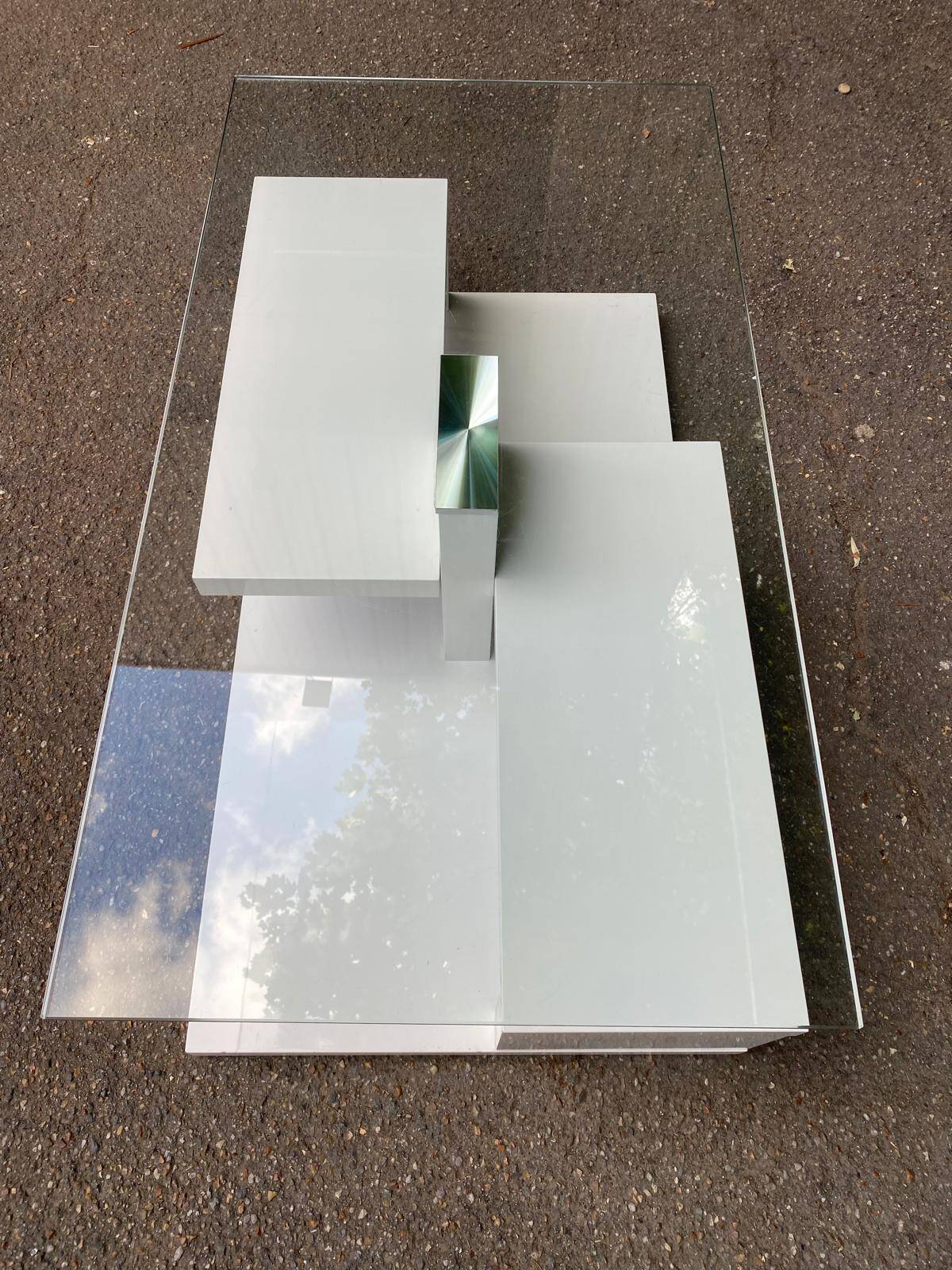 Glass and white lacquered coffee table
