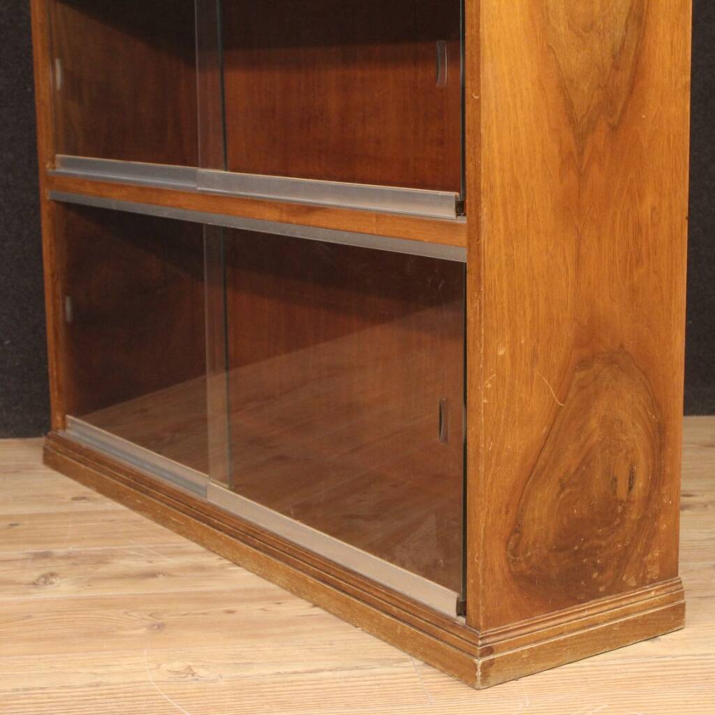 Pair of Italian bookcases in walnut wood with glass doors
