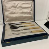 Ménagère de 26 couverts de table en inox et bakélite