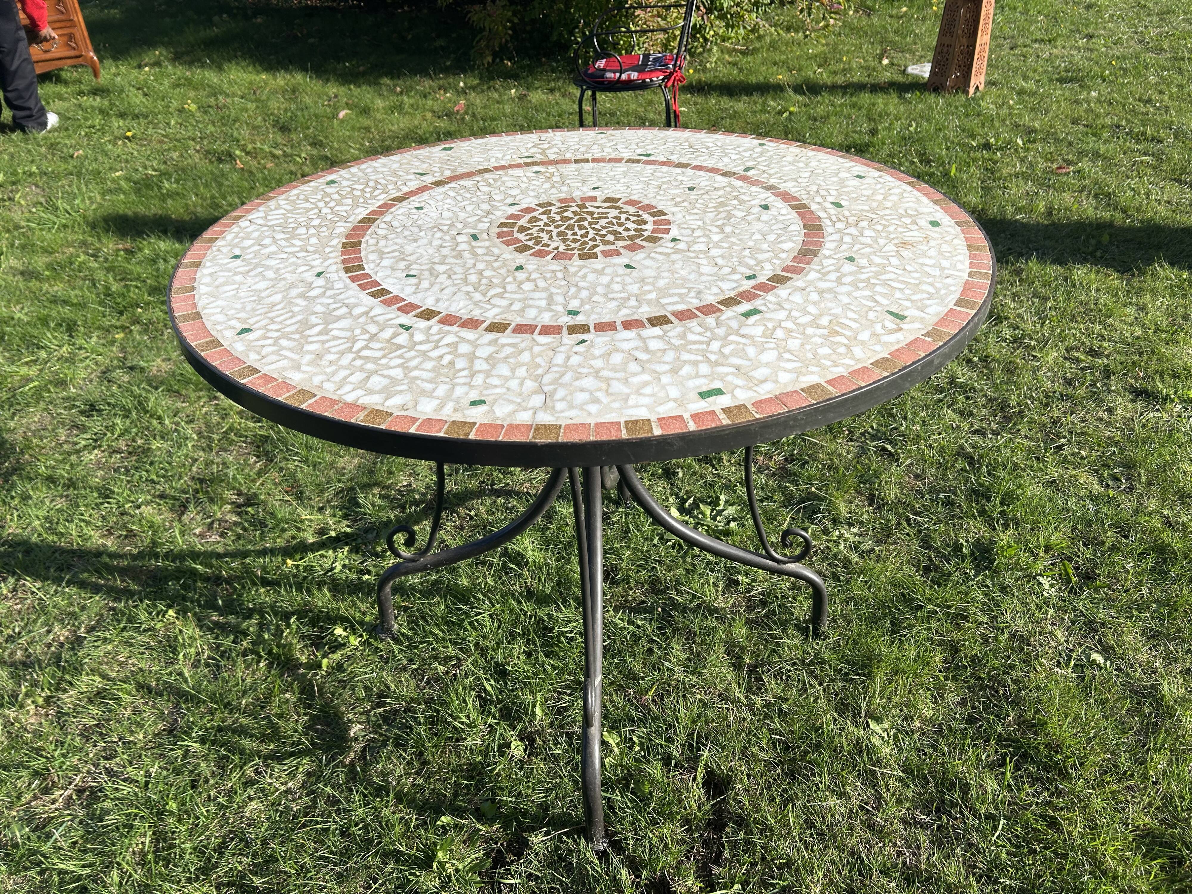 Iron table with ceramic top