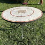 Iron table with ceramic top