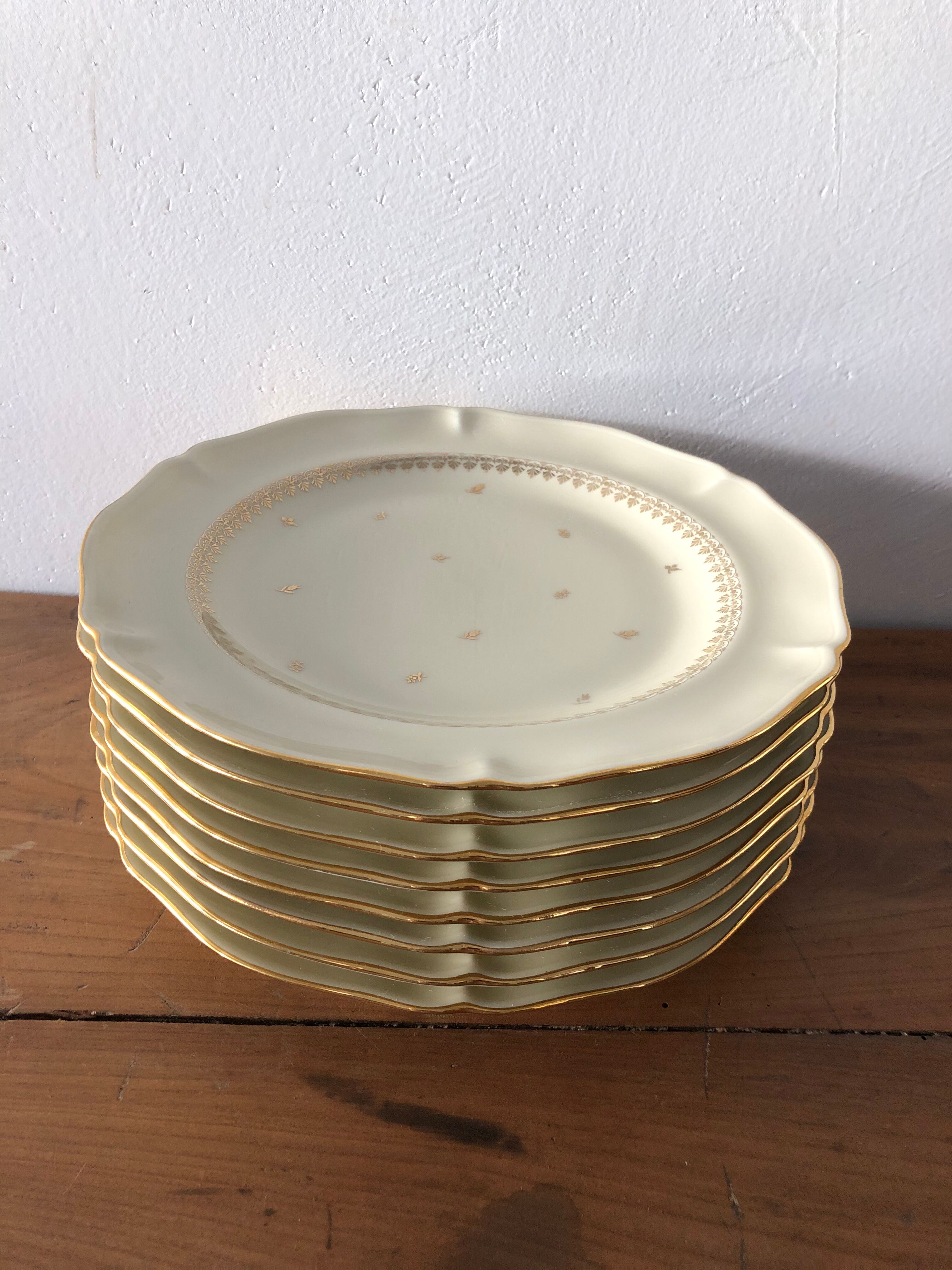 Service of 8 flat plates, Limoges