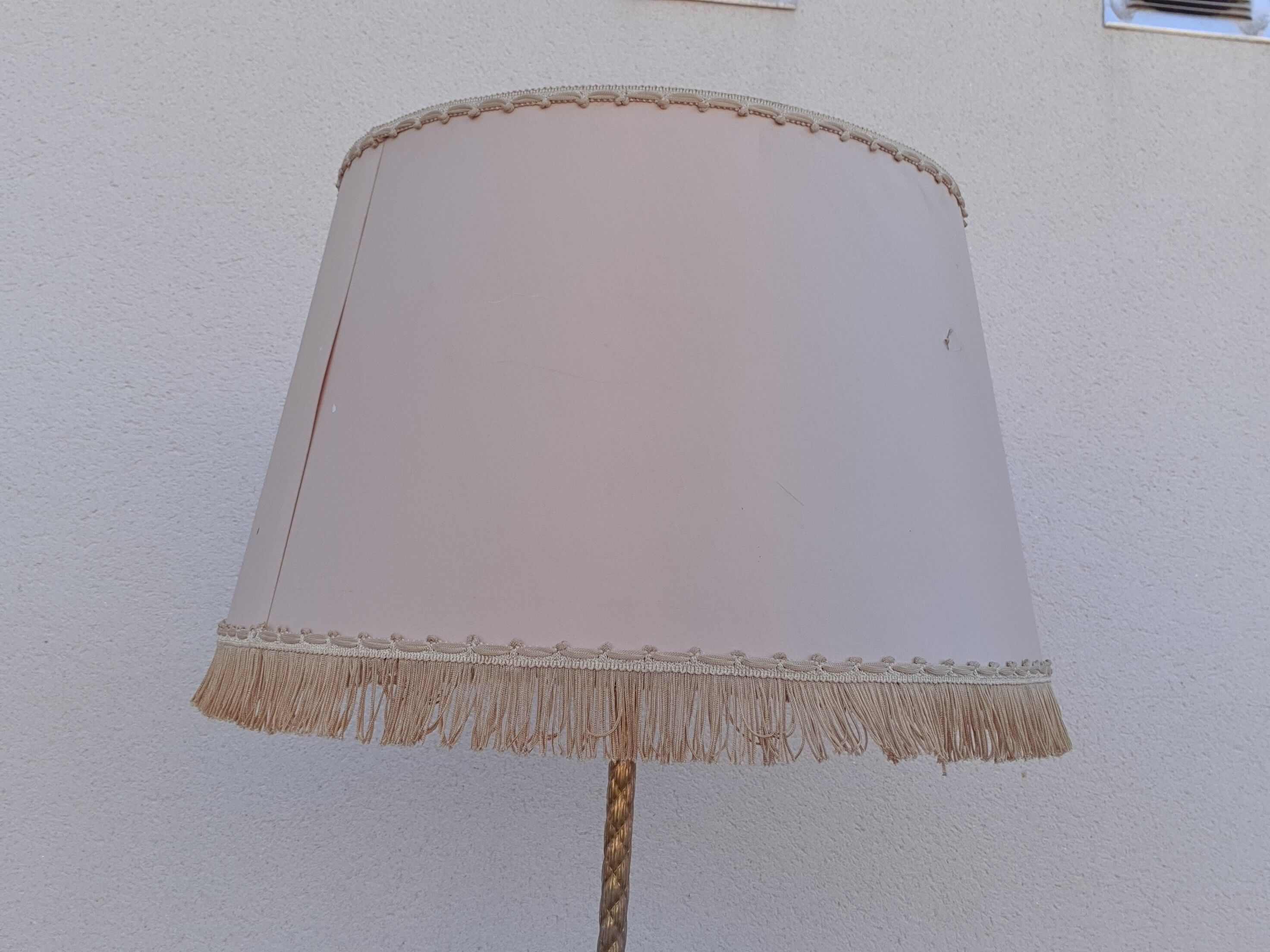 Twisted brass tripod floor lamp