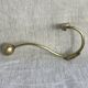 Pair of ball and hook coat hooks in brass