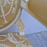 Louis XVI style cabriolet armchair with decorated medallion