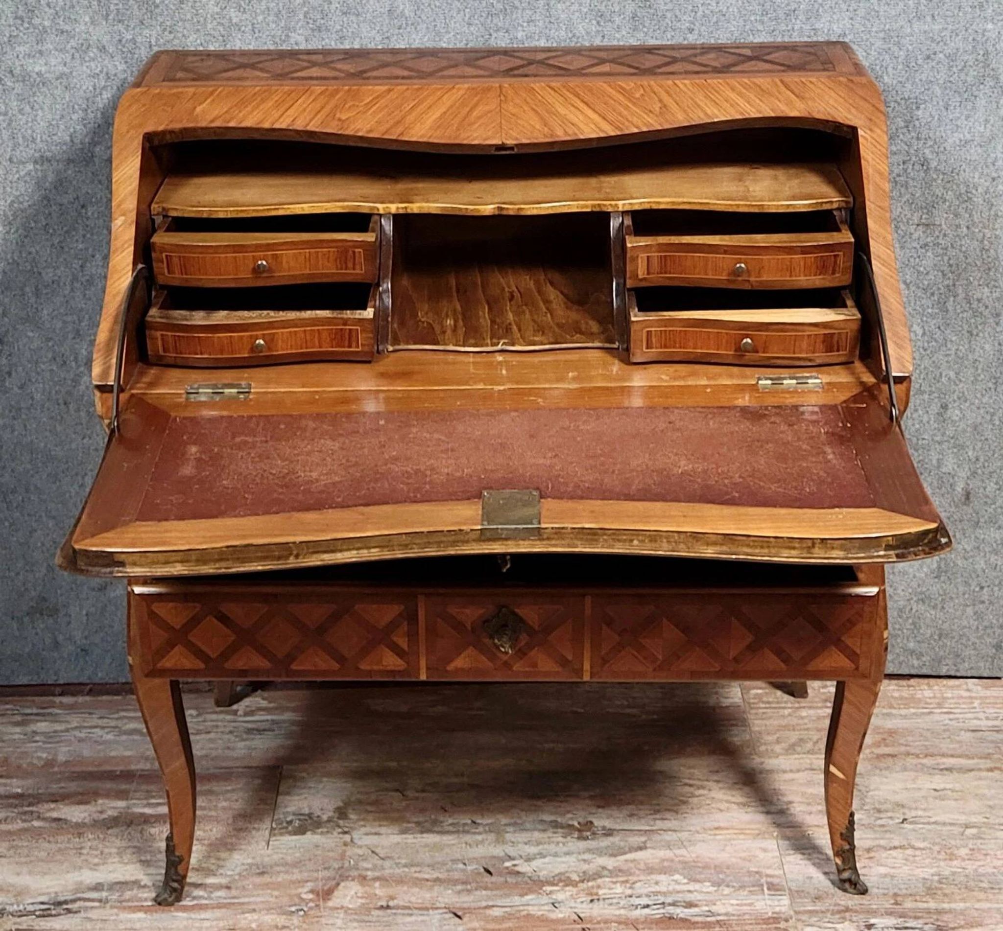 Louis XV period curved secretary desk in marquetry, circa 1750