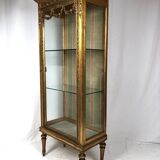 Louis XVI style showcase in wood and gilded stucco, circa 1900