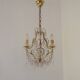 French gilt bronze three-light cage chandelier with pink and clear beaded swags.