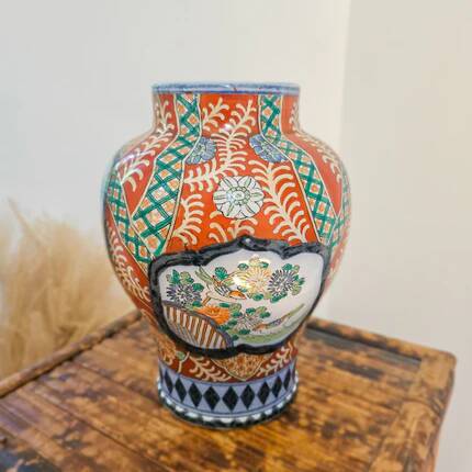 Vintage porcelain vase in the style of Imari by Petrus Regout Maastricht.