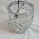 Ice bucket and spoon thereon