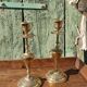 Pair of chiseled brass candle holders