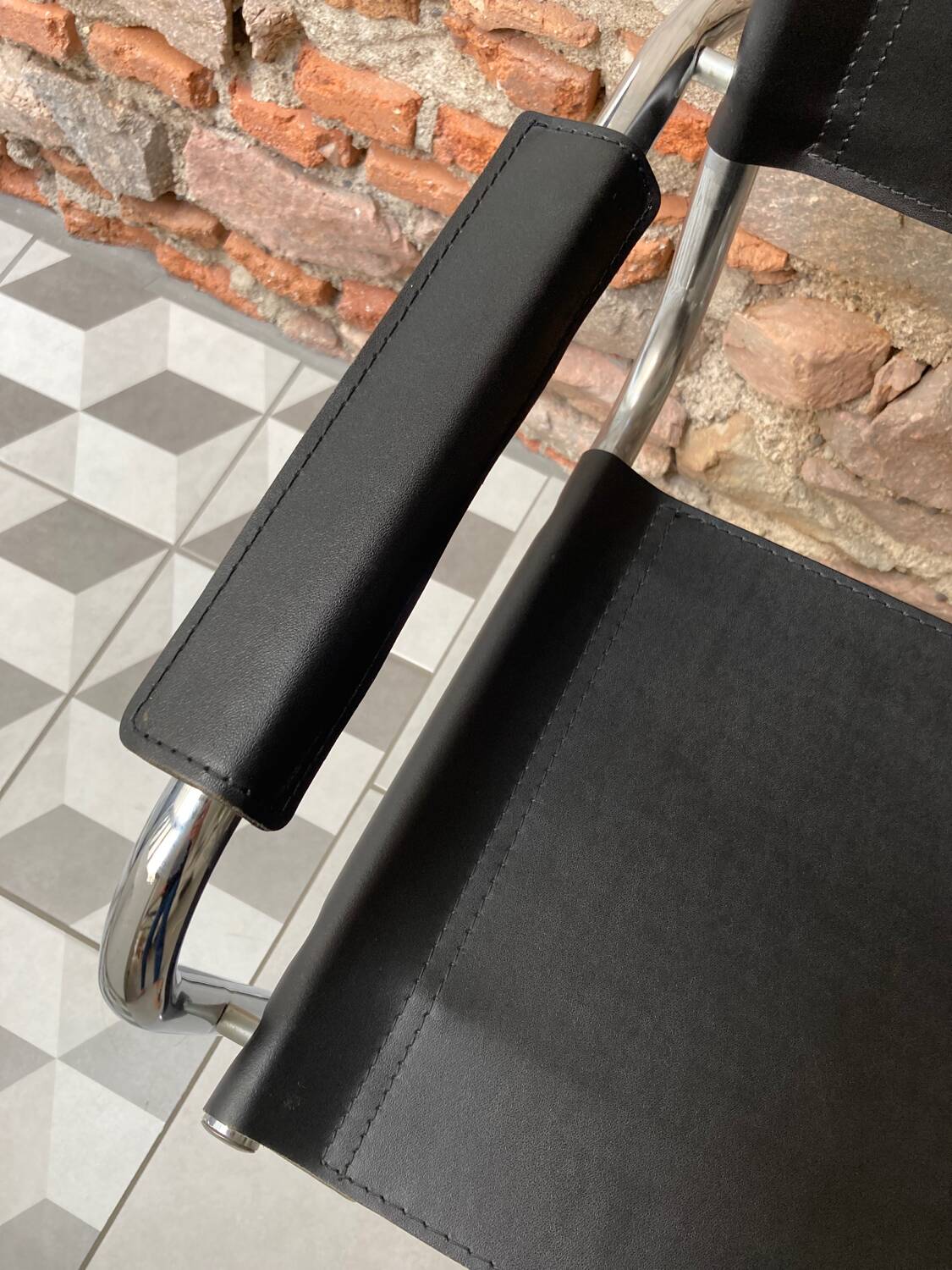 Chrome and black leather armchair type B34