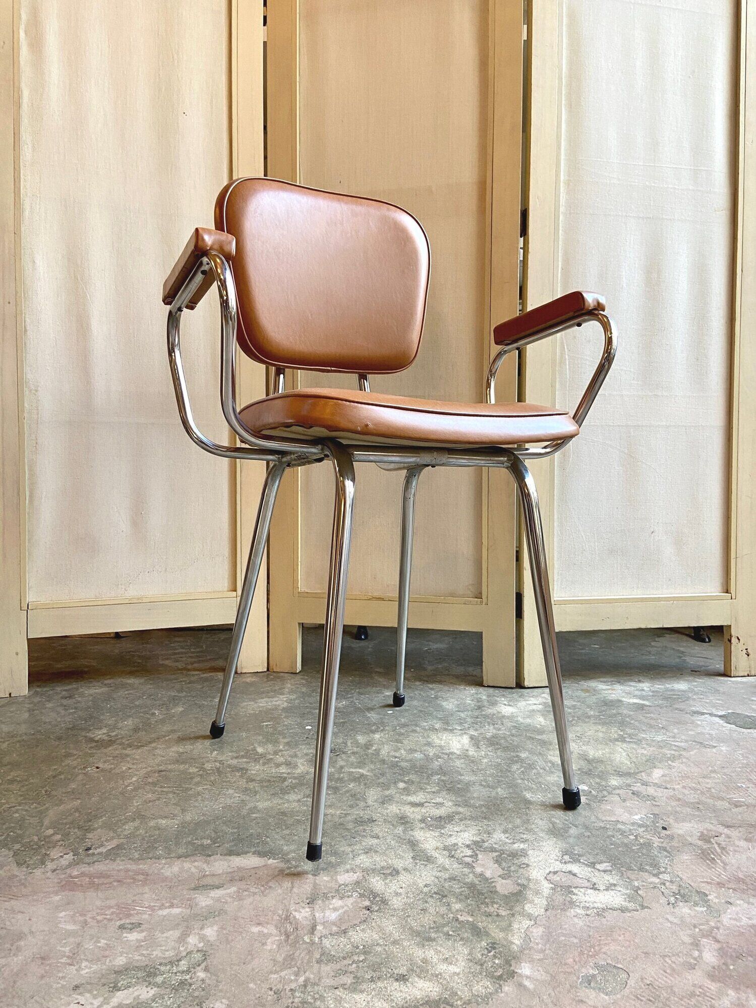 Armchair in chromed metal and tawny skaï 1950s