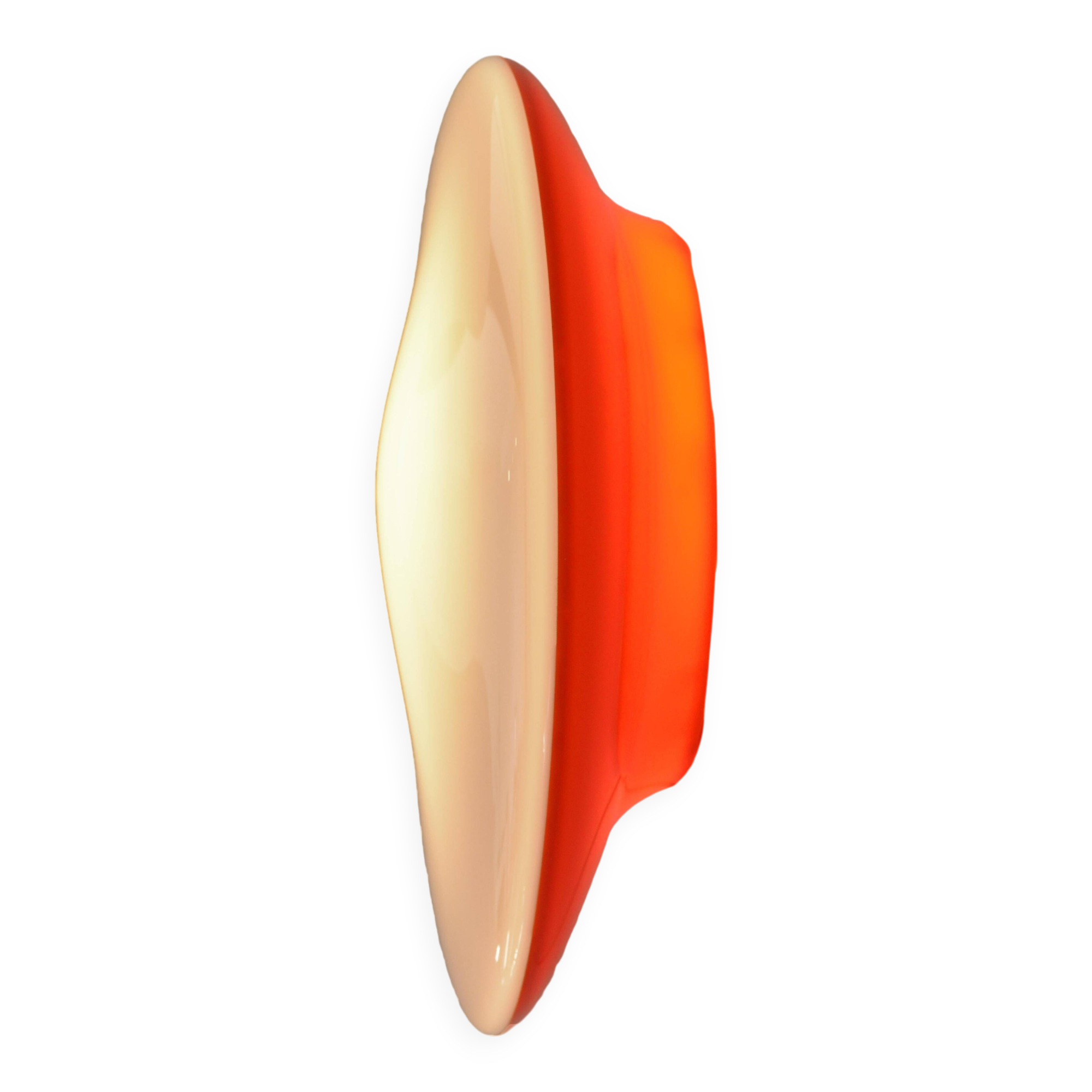 Oval wall lamp Artemide Italy design Patrick Jouin orange and white.