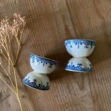 Duo of ancient diabolo shells in earthenware iron earth