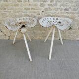 Pair of industrial tripod stools with tractor seat, 50s