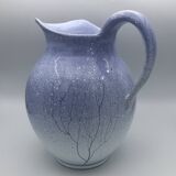 Blue glazed terracotta pitcher with hand-painted decoration, signed