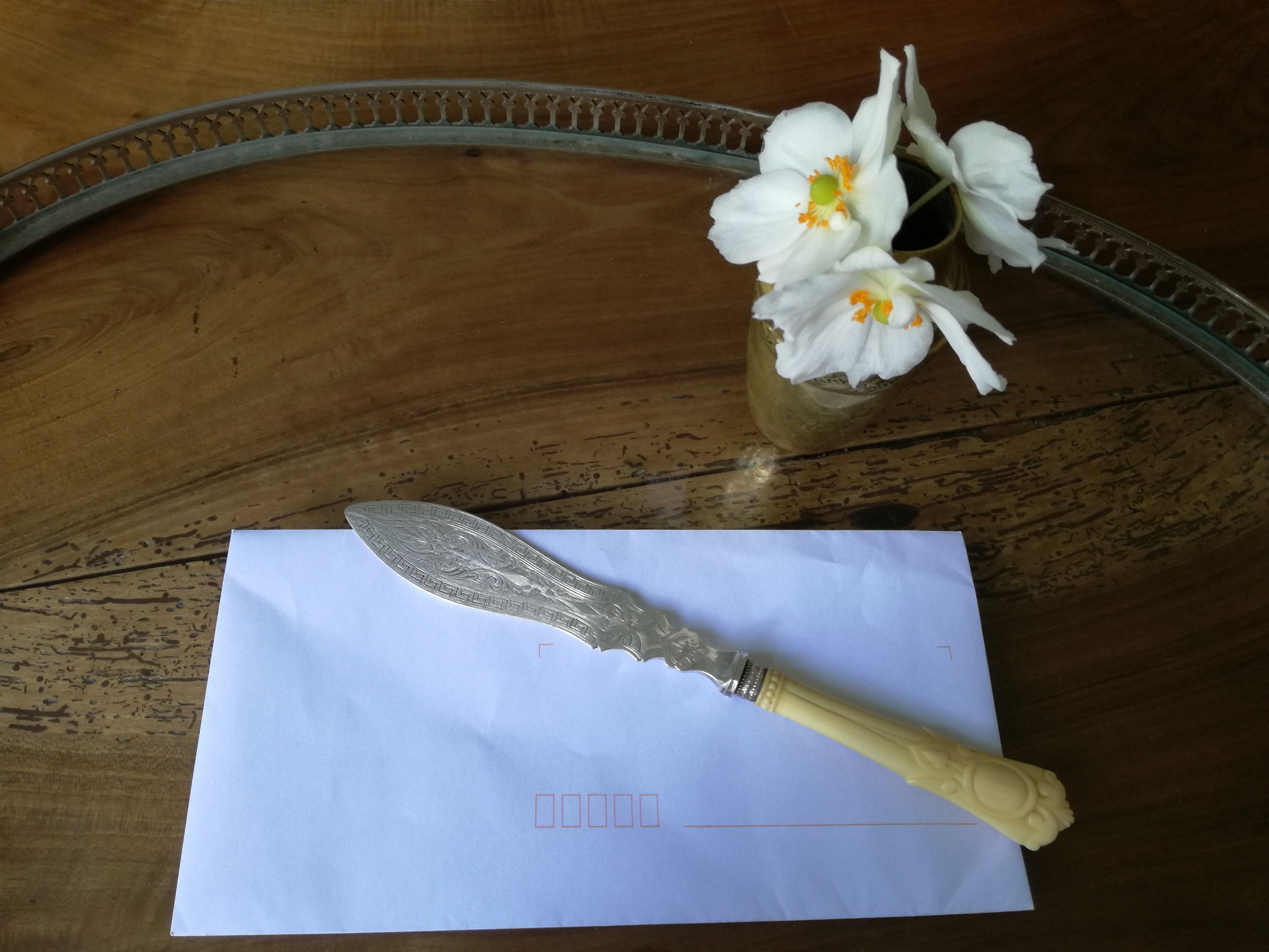 Silver and ivory paper cut