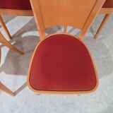 12 orange Baumann chairs 1970s