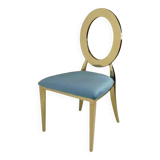 Gold chair with turquoise velvet seat
