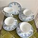 5 coffee cups with blue flower decor from the 70s