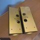 Pair of Menzel Leuchten cylindrical wall lights, brass details, 1990s