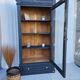 Black and raw wood dresser