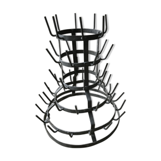 Old metal hedgehog bottle holder