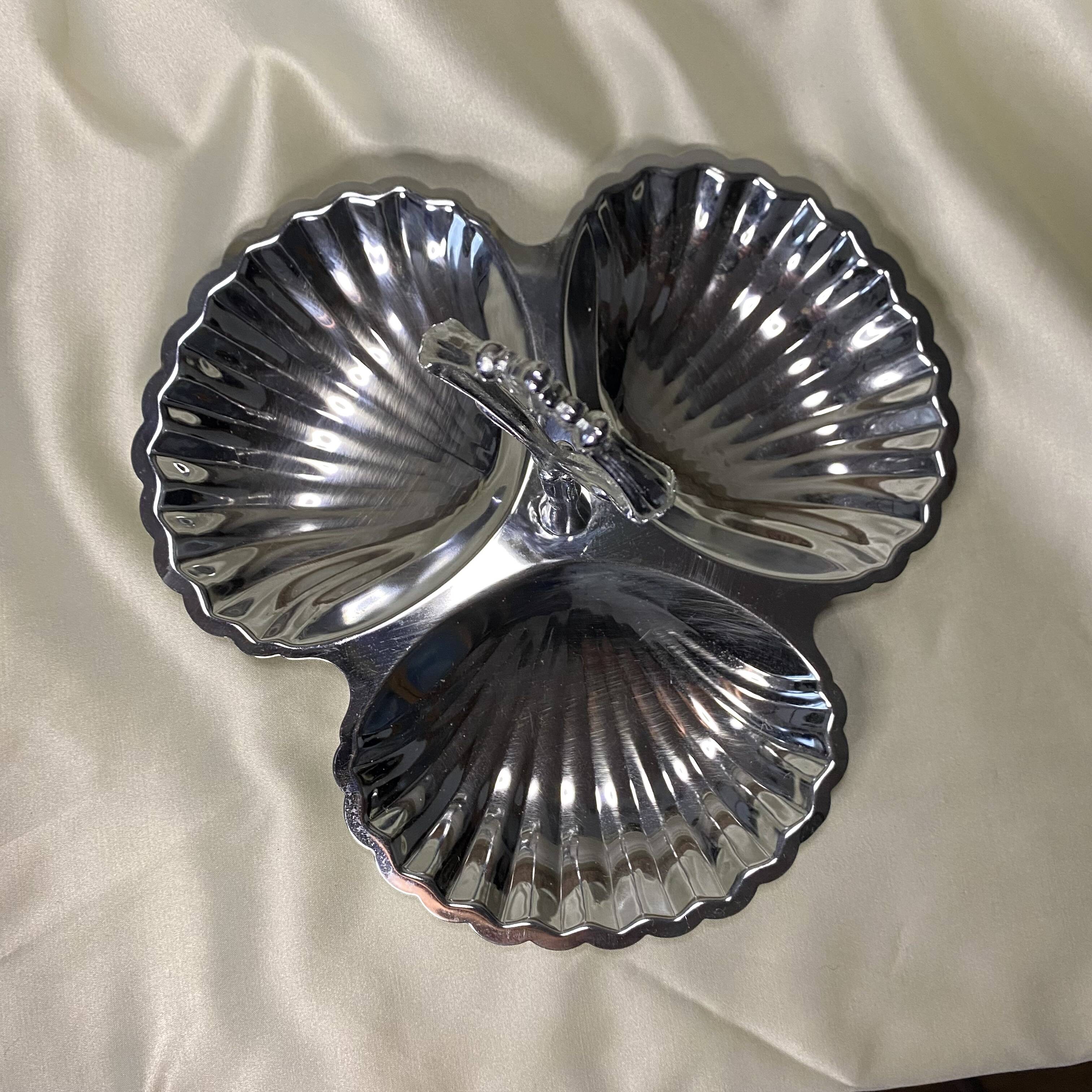 Stainless steel serving platter in the shape of seashells