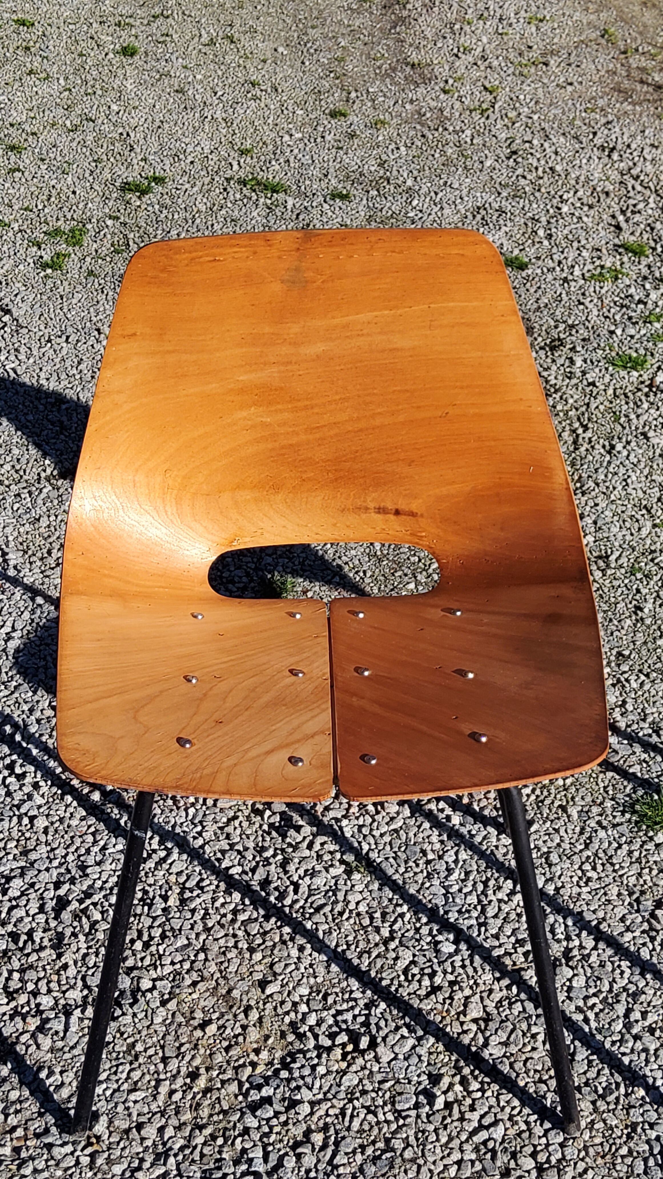 Pair of tonneau chairs by Pierre Guariche plywood base tubes 1954
