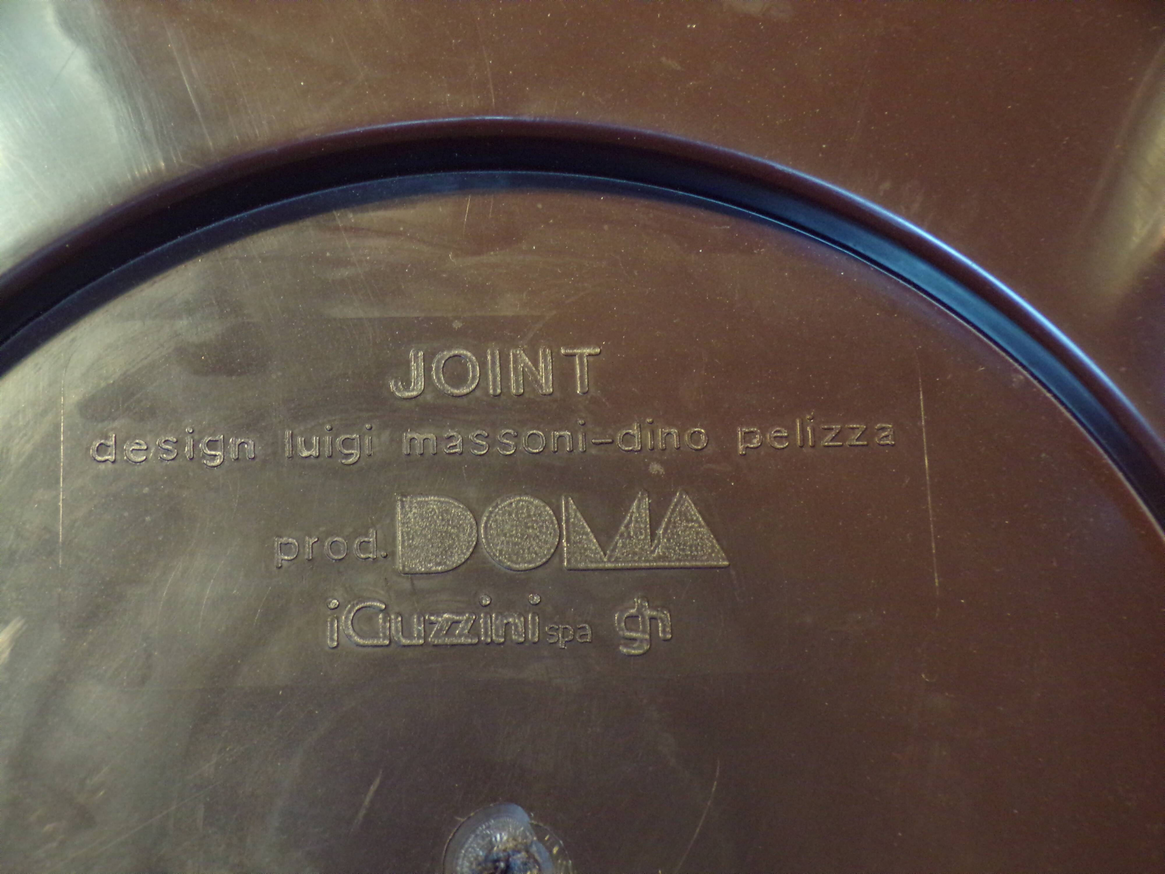 Chaise Joint par Luigi Massoni et Dino Pelizza pour Guzzini
