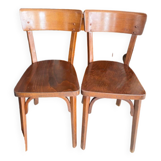 Old pair of Baumann bistro chairs