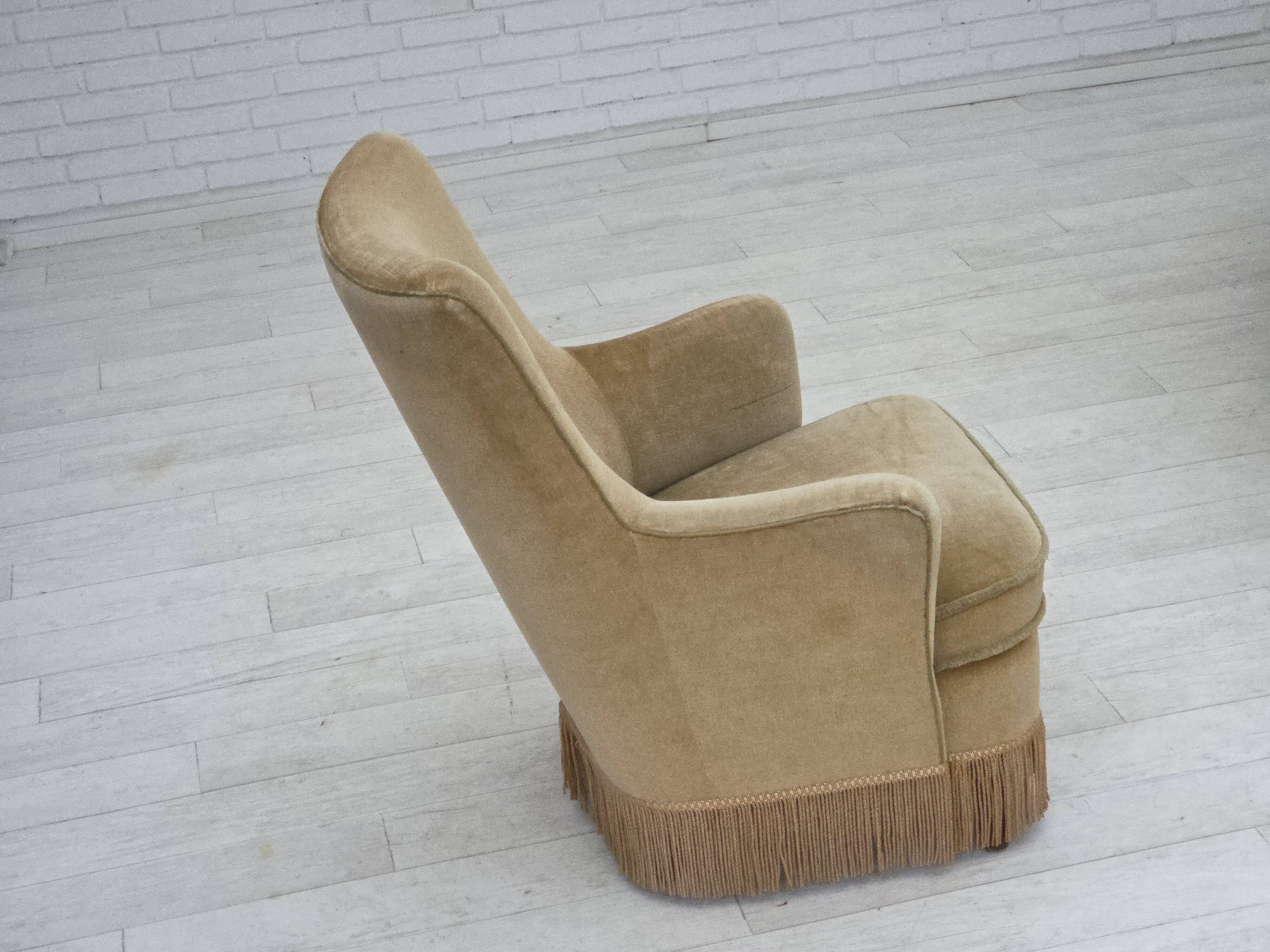 1970s, Danish armchair., original light green furniture velour.