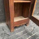 Old narrow wooden showcase.