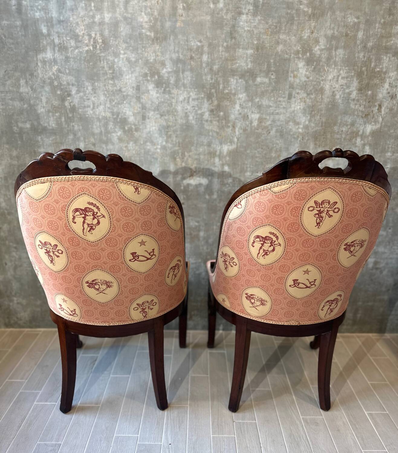 Pair of carved solid mahogany gondolas from the 19th century